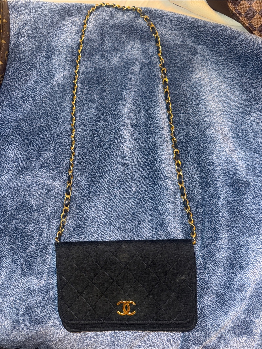 CHANEL Black Quilted Crossbody Bag with Gold Chain and CC Logo